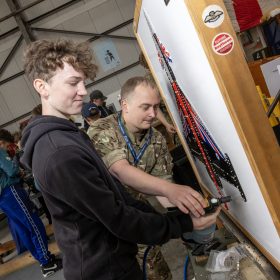 The RAF Cosford Airshow returned on Sunday 9th June 2024 hosting in excess of 55,000 people upholding the standard of 2023’s Airshow numbers. This Years theme was ‘Take Flight’ with displays, events and activities aiming to drive potential new recruits to kickstart their interest of a career in the RAF and develop an understanding of what the service does for the defence of the United Kingdom. Visitors were able to get close to the cutting edge of technology with RAF Aircraft and unique attractions across the show ground and immerse themselves in a thrilling action-packed flying display programme.
The RAF Cosford Airshow remains an excellent way for the Ministry of Defence to engage with the public and showcase the Royal Air Force’s capabilities and to celebrate the service’s history while looking ahead to the next generation of people and technology.
RAF Cosford in Shropshire is a major part of the Defence College of Technical Training (DCTT). It is at the centre of the RAF’s mission to deliver flexible, affordable, modern and effective technical training that meets the needs of the UK’s Armed Forces now and into the future. RAF Apprenticeships delivered at RAF Cosford were recently recognised as ‘Outstanding’ by Ofsted. RAF Cosford is also home to the popular RAF Museum and the world-renowned Cosford Airshow.