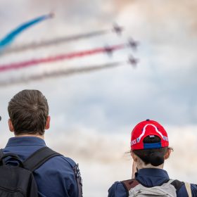 The RAF Cosford Air show, Sunday 8th June 2025 is the primary air show of the Royal Air Force attracting in excess of 55,000 visitors it is one of the biggest events in the West Midlands. This Years theme is ‘Commemorate, Celebrate, Innovate’. The air show will commemorate some of our history both in terms of assets and through displays in the Victory Village; Celebrate the work of the Royal Air Force, NATO Allies and Partner nations; And seek to inspire the next generation by showcasing how the armed forces innovate together and with our Defence sector partners in the STEM Hangar.
With displays, events and activities aiming to drive potential new recruits to kickstart their interest of a career in the RAF and develop an understanding of what the British Military, Allied Forces and Sister Services do for the defence of the United Kingdom. Visitors are able to get close to the cutting edge of technology with RAF Aircraft and unique attractions across the show ground and immerse themselves in a thrilling action-packed flying display programme.
The RAF Cosford Air show is an excellent way for the Ministry of Defence to engage with the public and showcase the Royal Air Force’s capabilities and to celebrate the service’s history while looking ahead to the next generation of people and technology.
RAF Cosford in Shropshire is a major part of the Defence College of Technical Training (DCTT). It is at the centre of the RAF’s mission to deliver flexible, affordable, modern and effective technical training that meets the needs of the UK’s Armed Forces now and into the future. RAF Apprenticeships delivered at RAF Cosford were recently recognised as ‘Outstanding’ by Ofsted. RAF Cosford is also home to the popular RAF Museum and the world-renowned Cosford Air show.
RAF Cosford opened in 1938 and is the home of RAF Engineering. The station currently trains all of the RAF’s Aircraft Technicians (Mechanical, Avionics, Weapons and Survival Equipment), Cyberspa