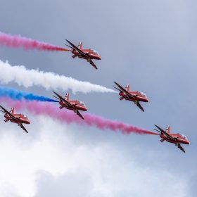 The RAF Cosford Air show, Sunday 8th June 2025 is the primary air show of the Royal Air Force attracting in excess of 55,000 visitors it is one of the biggest events in the West Midlands. This Years theme is ‘Commemorate, Celebrate, Innovate’. The air show will commemorate some of our history both in terms of assets and through displays in the Victory Village; Celebrate the work of the Royal Air Force, NATO Allies and Partner nations; And seek to inspire the next generation by showcasing how the armed forces innovate together and with our Defence sector partners in the STEM Hangar.
With displays, events and activities aiming to drive potential new recruits to kickstart their interest of a career in the RAF and develop an understanding of what the British Military, Allied Forces and Sister Services do for the defence of the United Kingdom. Visitors are able to get close to the cutting edge of technology with RAF Aircraft and unique attractions across the show ground and immerse themselves in a thrilling action-packed flying display programme.
The RAF Cosford Air show is an excellent way for the Ministry of Defence to engage with the public and showcase the Royal Air Force’s capabilities and to celebrate the service’s history while looking ahead to the next generation of people and technology.
RAF Cosford in Shropshire is a major part of the Defence College of Technical Training (DCTT). It is at the centre of the RAF’s mission to deliver flexible, affordable, modern and effective technical training that meets the needs of the UK’s Armed Forces now and into the future. RAF Apprenticeships delivered at RAF Cosford were recently recognised as ‘Outstanding’ by Ofsted. RAF Cosford is also home to the popular RAF Museum and the world-renowned Cosford Air show.
RAF Cosford opened in 1938 and is the home of RAF Engineering. The station currently trains all of the RAF’s Aircraft Technicians (Mechanical, Avionics, Weapons and Survival Equipment), Cyberspa